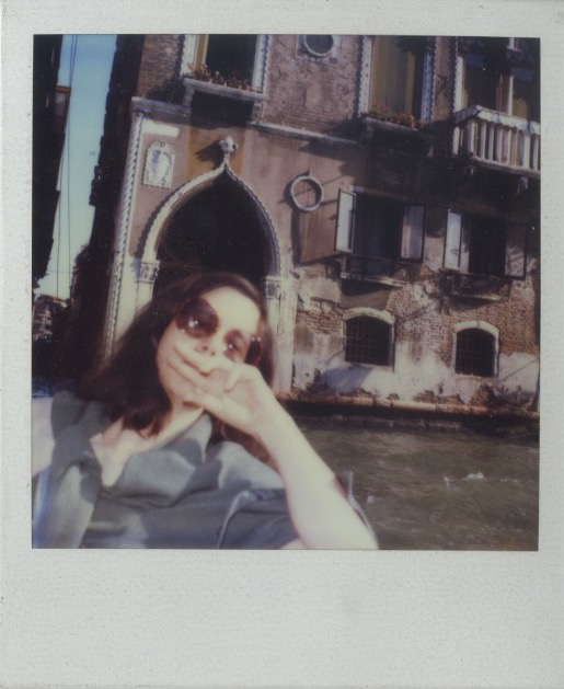 Polaroid of Madeline on a boat in Venice